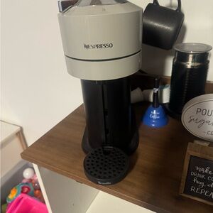 Nespresso Machine in Elegant Black and Cream